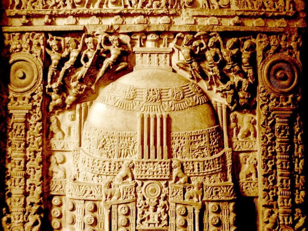 Relief of the Amarāvatī stūpa carved in stone, with dense narrative scenes and decorative motifs, exemplifying early South Indian Buddhist visual complexity.