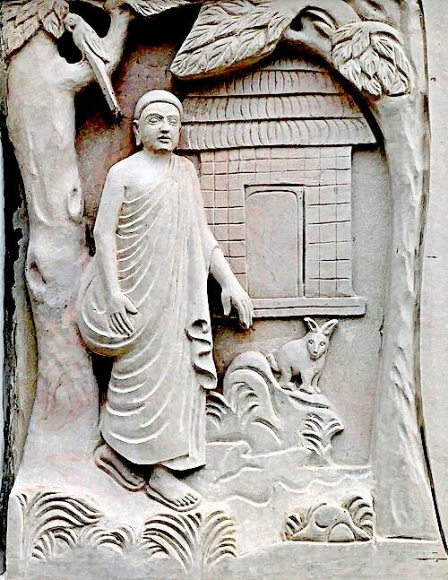 Buddhist relief at Mahabodhi Vihara in Hyderabad showing the Bodhisattva Siddhartha encountering an ascetic, the fourth of the Four Sights that inspired his search for liberation.