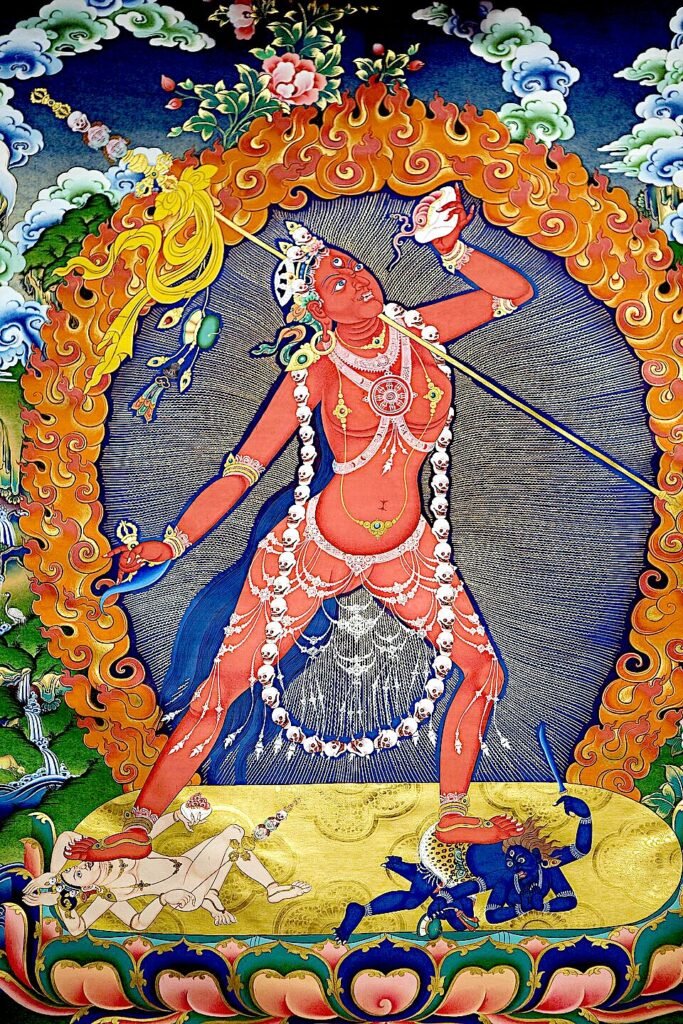 Tantric Buddhism and the Himalayan World: Cultural Exchanges and Religious Transformation Vajrayogini thangka depicting a red tantric female deity holding ritual knife and skull cup, symbolizing wisdom and transformation in Vajrayana Buddhism.